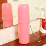 Cylindrical toothbrush holder for travel, pink color